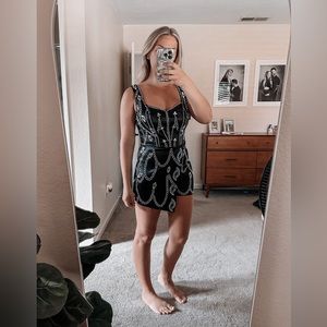 NanaMacs black rhinestone satin romper